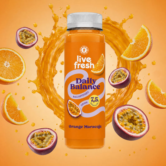 LiveFresh Daily Balance Fiber Source Drink Orange-Passion Fruit with oranges and passion fruit and a swirl of juice in the background.