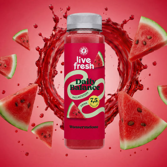 LiveFresh Daily Balance Fiber Source Drink: Watermelon with fresh watermelon chunks and a swirl of juice in the background